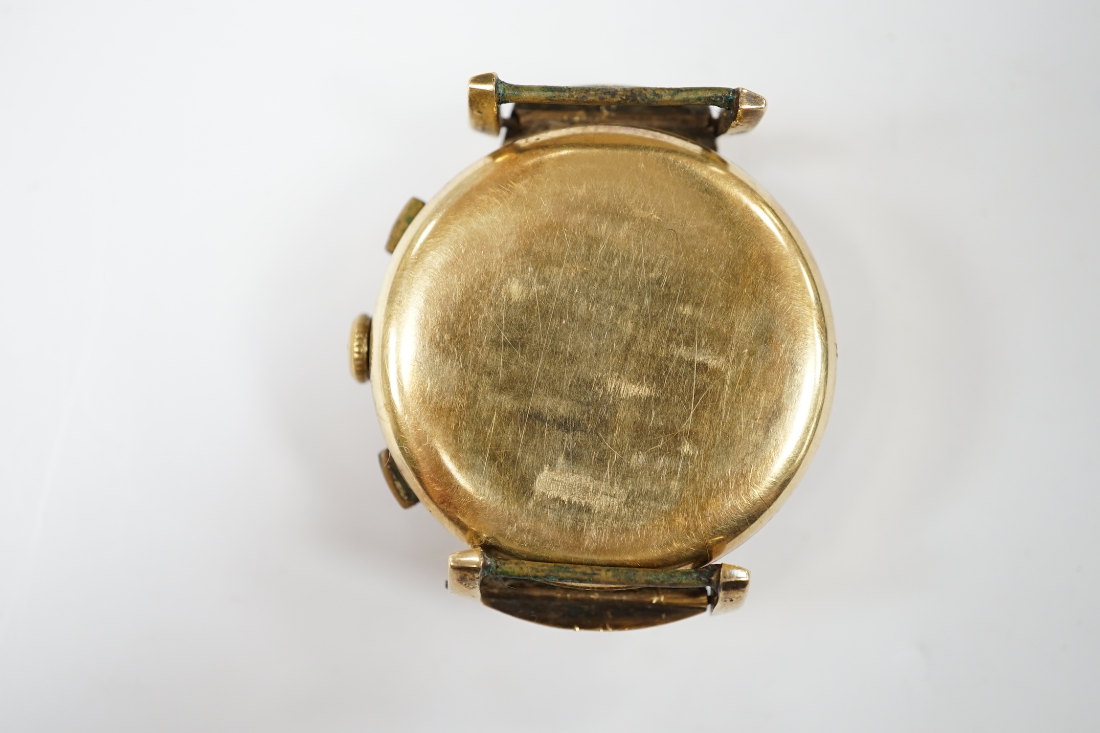 A gentleman's gilt metal Marvin chronograph manual wind black dial wrist watch, no strap, case diameter 36mm.
